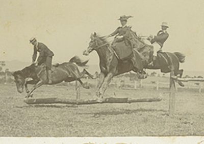 The children of Jacky and Barbara White steeplechasing around the paddocks at Fulham Farm, Adelaide